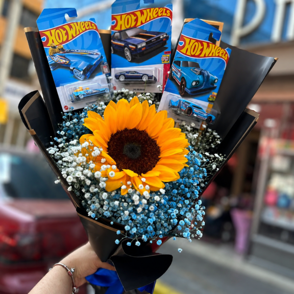 Blue Racer: arreglo floral con girasoles — Wallflower Guatemala