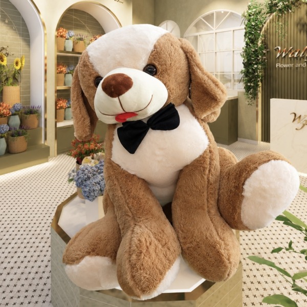 Peluche grande de perro café y blanco con corbatín negro — Wallflower Guatemala